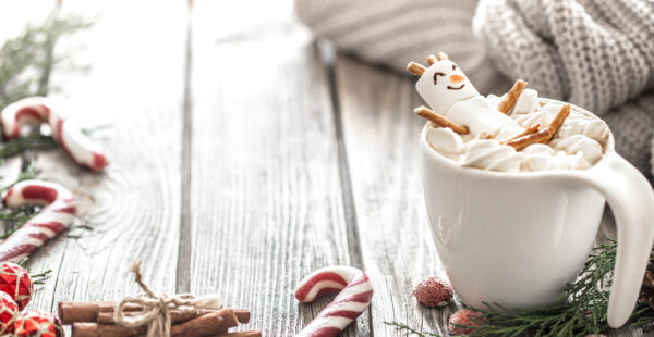Peppermint hot Cocoa Hot cocoa cup with peppermint and mashmallow snowman winter scene